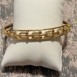 Elegant Gold Bracelet with Silver Accents
